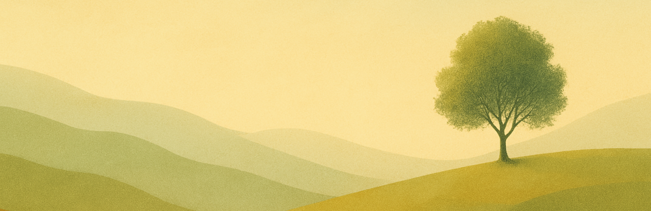 A lone tree in a softly lit golden landscape